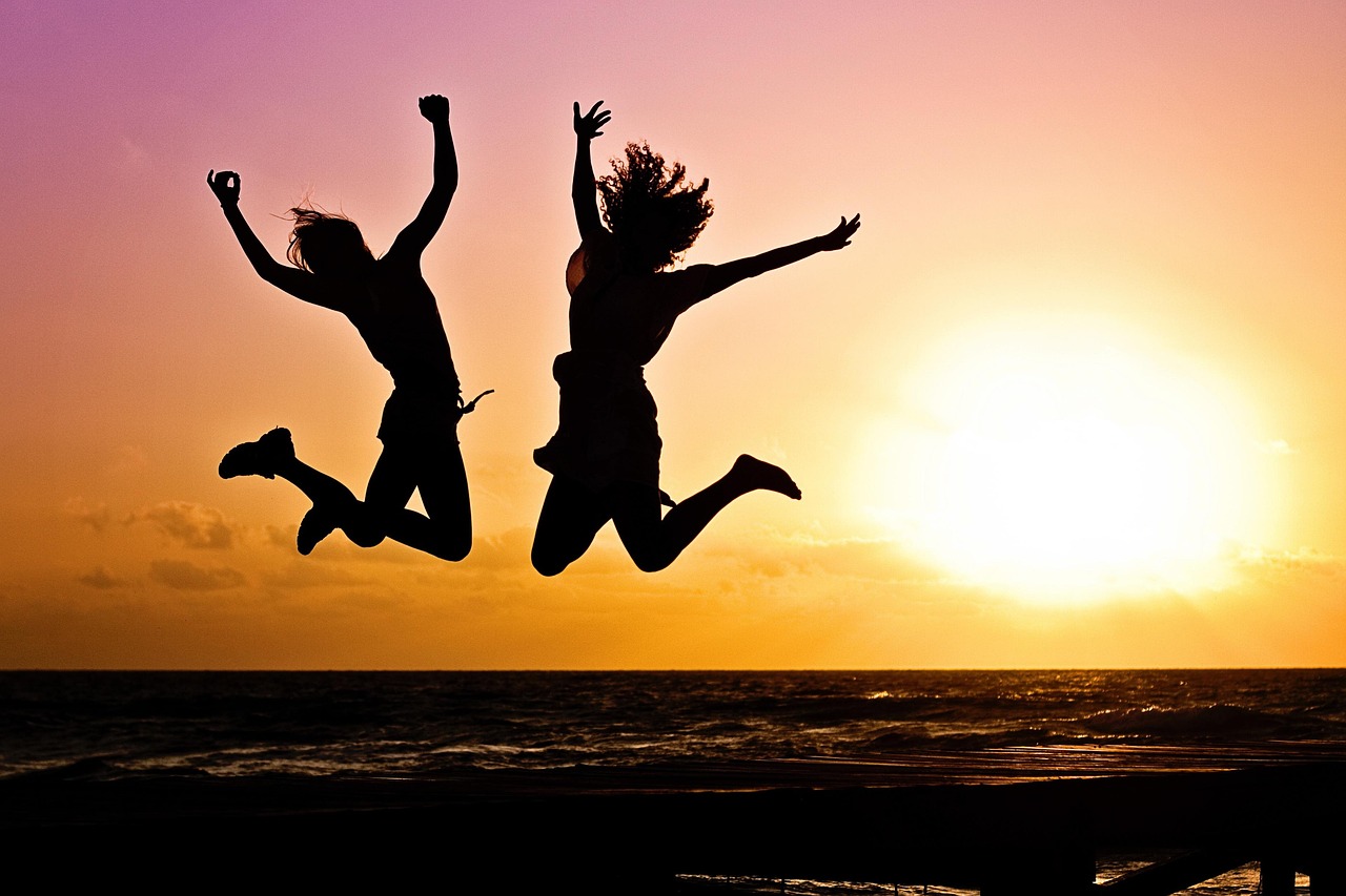 embark new year background, sunset, beach, silhouettes, jump, jumping, youth, active, happy, pair, girls, young women, people, joy, freedom, seaside, nature, dusk